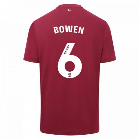 Kandiny Enfant Maillot Megan Bowen #6 Rouge Tenues Extérieur 2023/24 T-Shirt