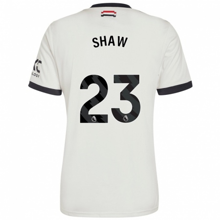 Kandiny Enfant Maillot Luke Shaw #23 Blanc Cassé Troisieme 2024/25 T-Shirt